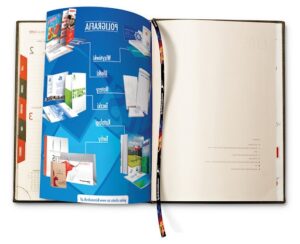 Wydruk i wklejenie wklejki reklamowej Kalendarze książkowe 2025